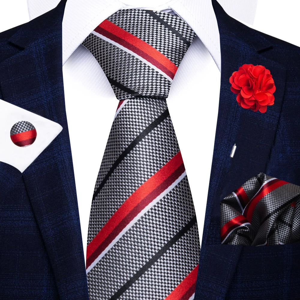 Men’s red striped tie set with handkerchief, cufflinks, and pin for wedding or formal suit