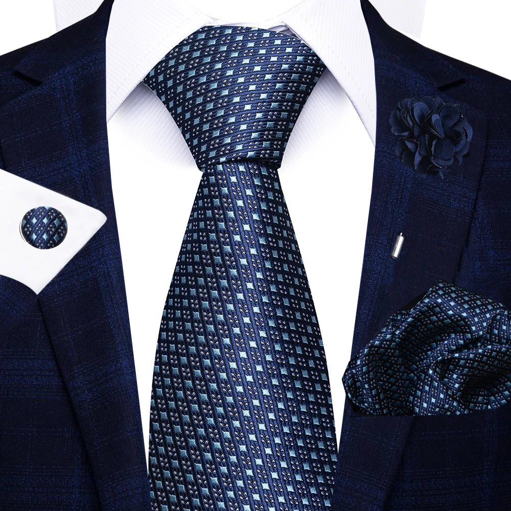 Men’s red striped tie set with handkerchief, cufflinks, and pin for wedding or formal suit