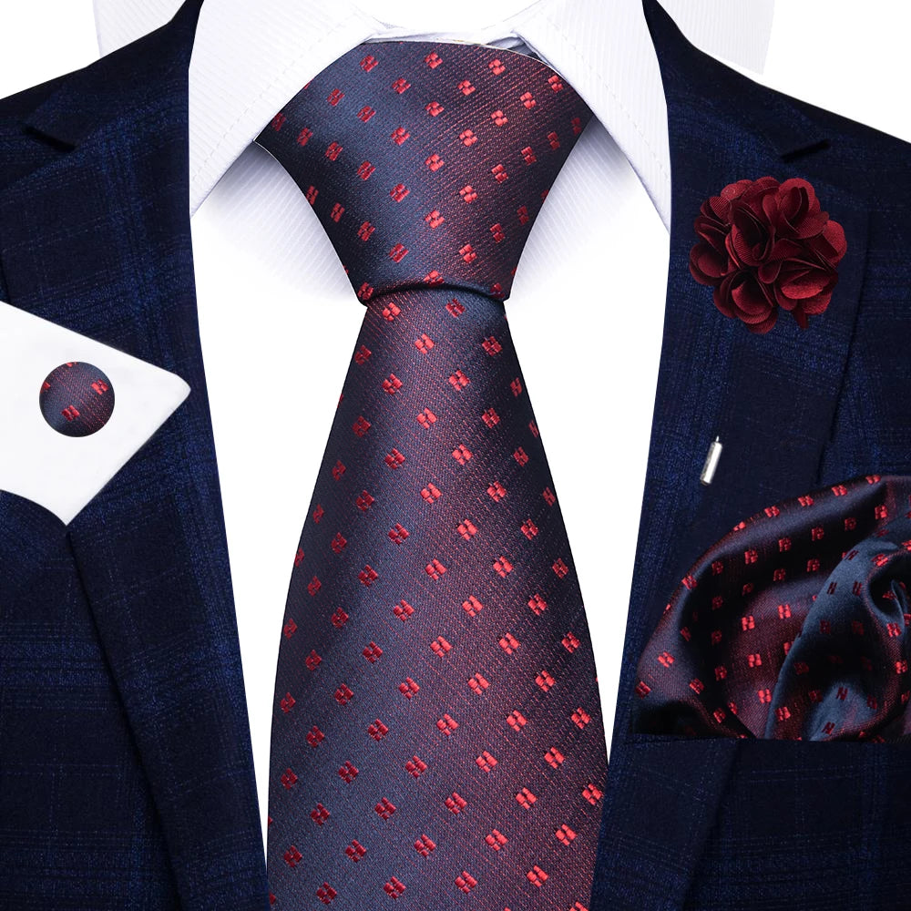 Men’s red striped tie set with handkerchief, cufflinks, and pin for wedding or formal suit