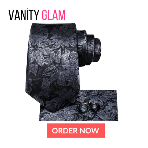Floral patterned tie, pocket square, and cufflinks with 'Vanity Glam' branding on a white background.