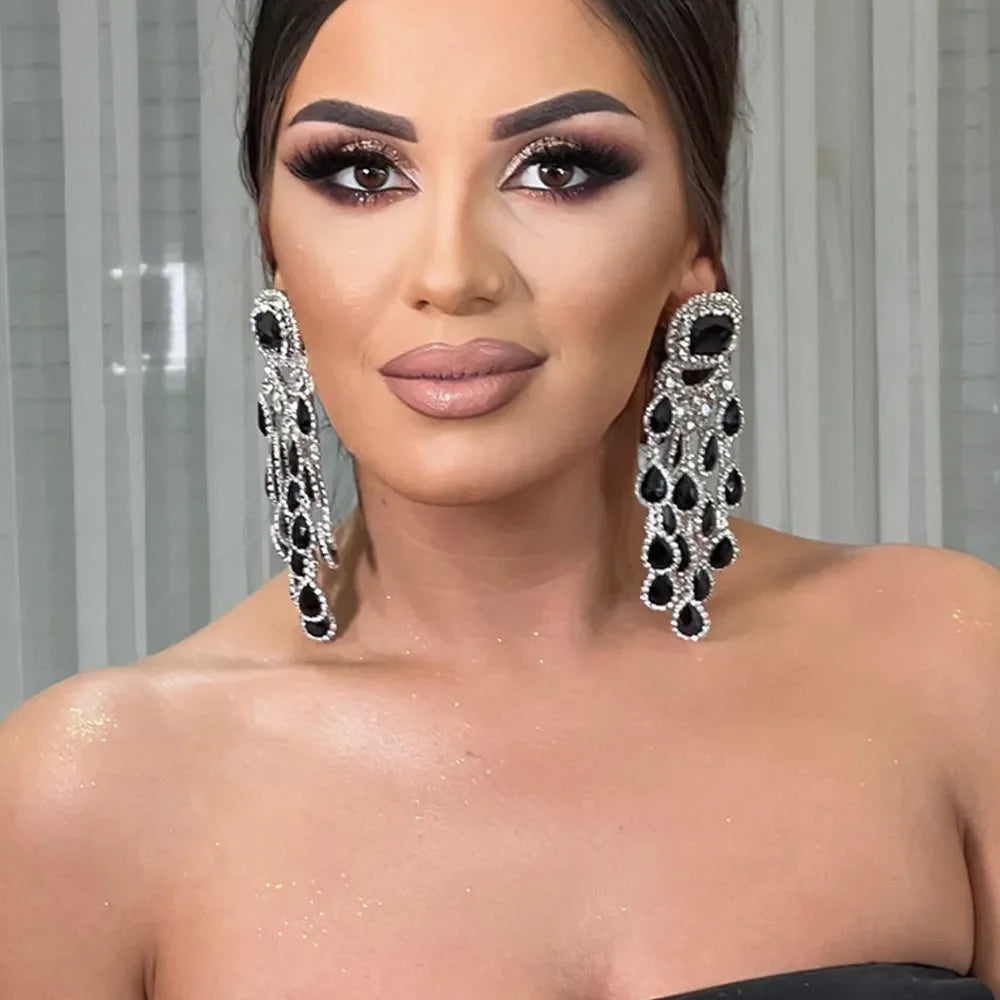 Model using Elegant Bridal Crystal Tassel Earrings