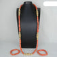 Coral beaded necklace with gold accents on a black mannequin against a gray background. Fashion Nigerian Coral Beads Set