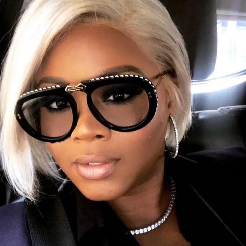 model using black diamond sunglasses 