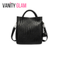 black woven patter handbag, vanity glam logo