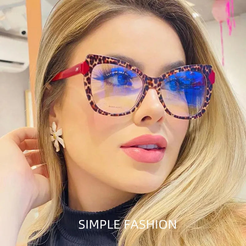 model using red leopard sunglasses