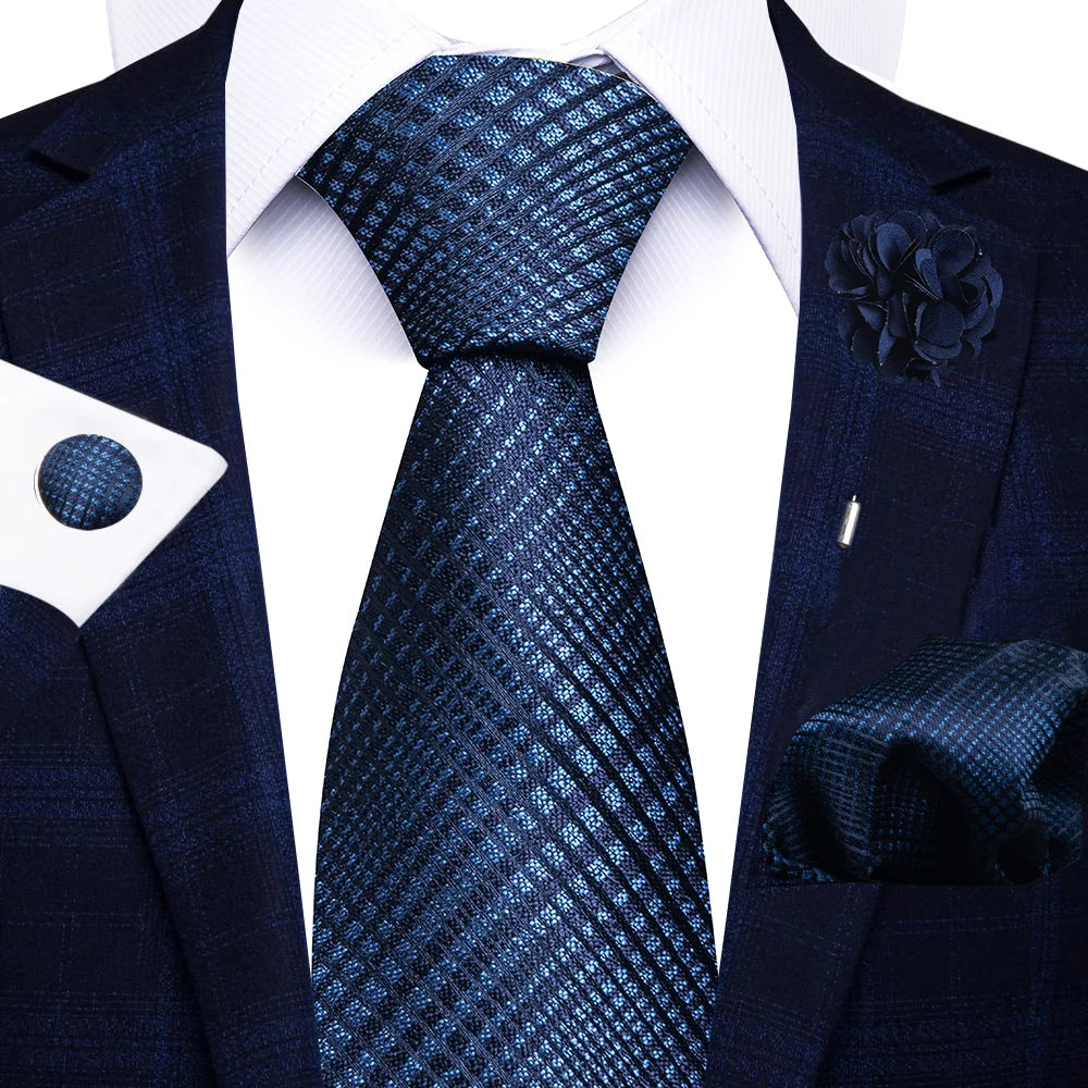 Men’s red striped tie set with handkerchief, cufflinks, and pin for wedding or formal suit