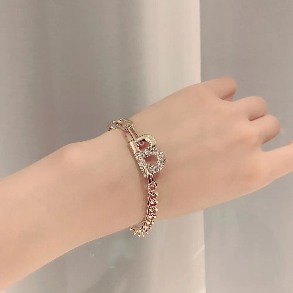 Model Using Rhinestone Initial Luxe Charm Bracelet