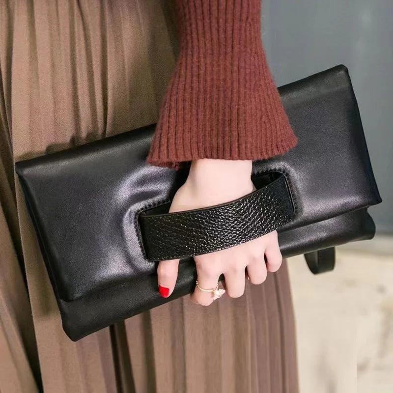 Serpentine Pattern Genuine Leather Clutch Bag