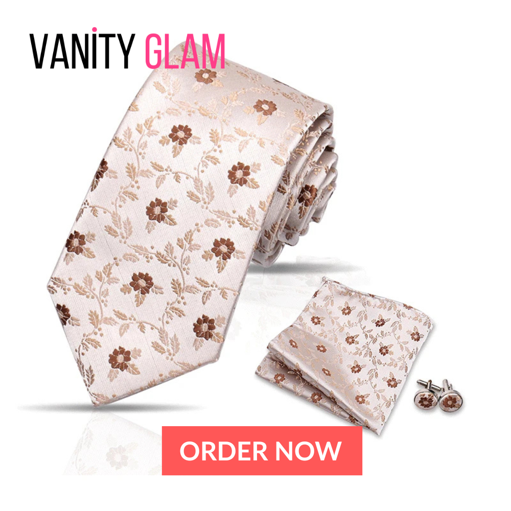 Floral tie, pocket square, and cufflinks set with 'Vanity Glam' branding on a white background.