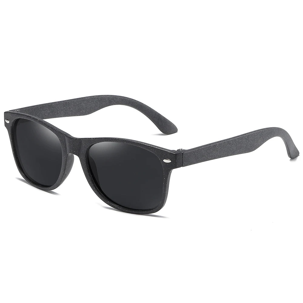 Black sunglasses with dark lenses on a white background