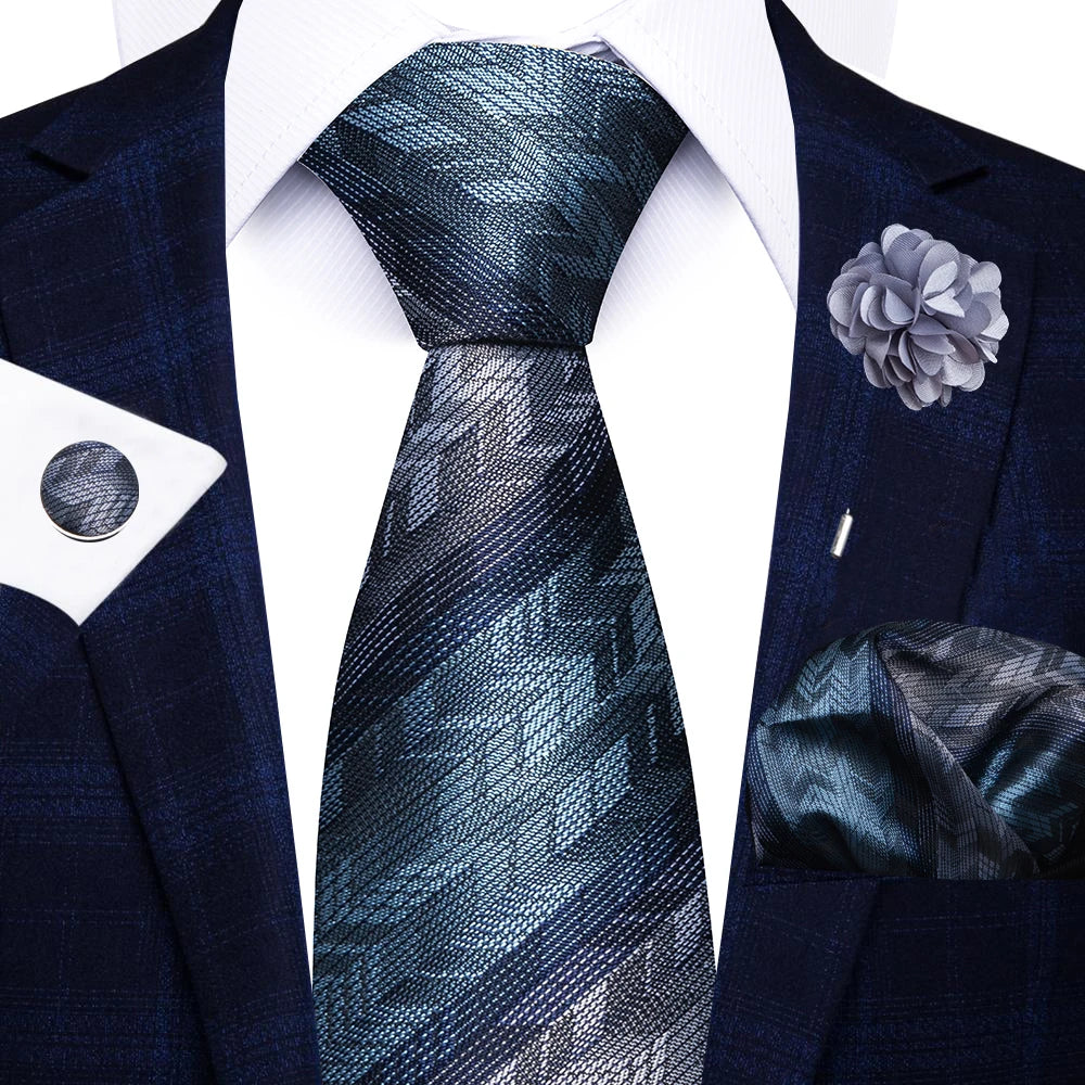 Men’s red striped tie set with handkerchief, cufflinks, and pin for wedding or formal suit