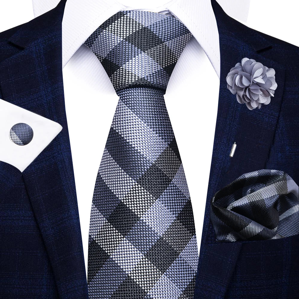 Men’s red striped tie set with handkerchief, cufflinks, and pin for wedding or formal suit