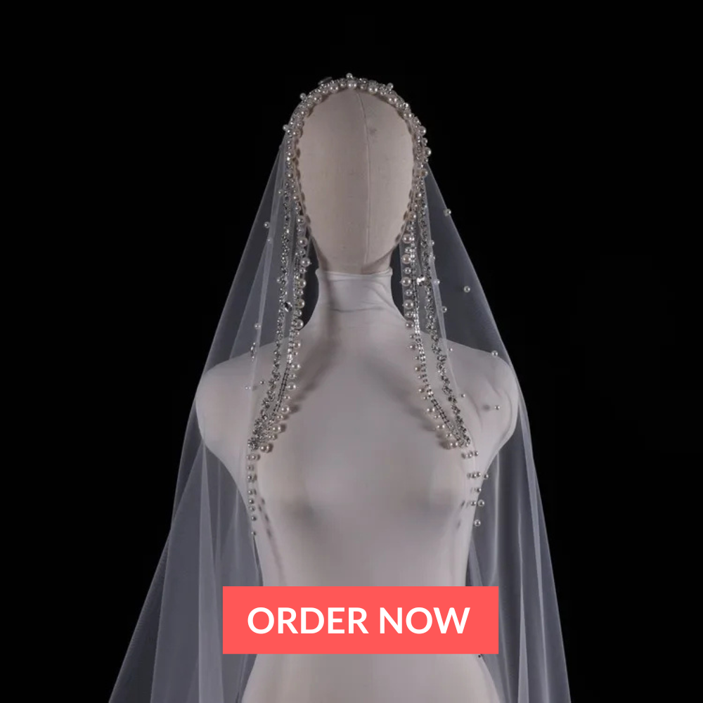 Vintage ivory bridal veil with pearls and rhinestones, elegant wedding headdress for bride.